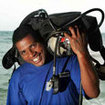 PADI Divemasters carry out the onerous tasks with a warm smile